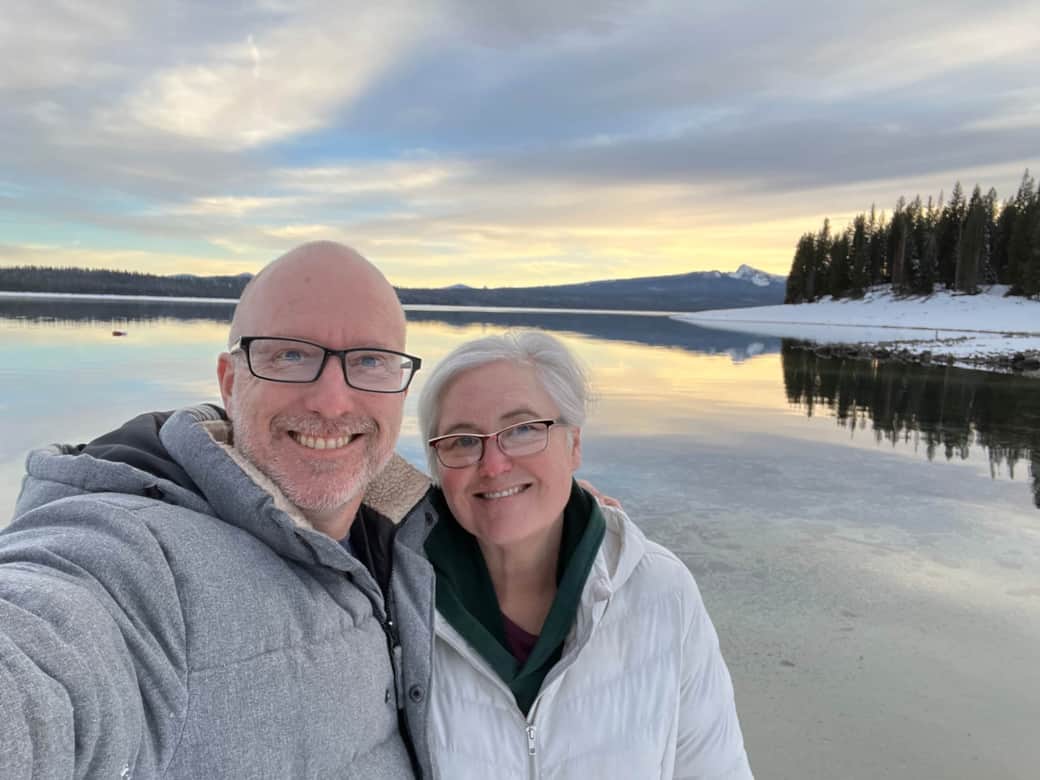 Hosts/Owners Andrew and Kim with Crescent Lake in the background