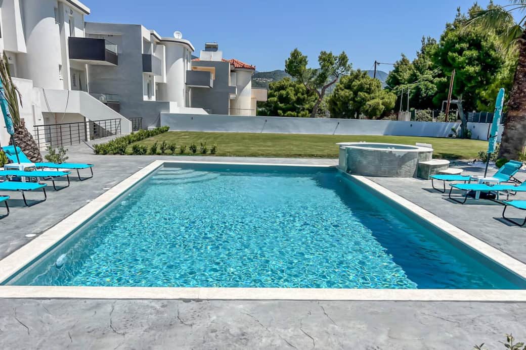 Pool with sun loungers