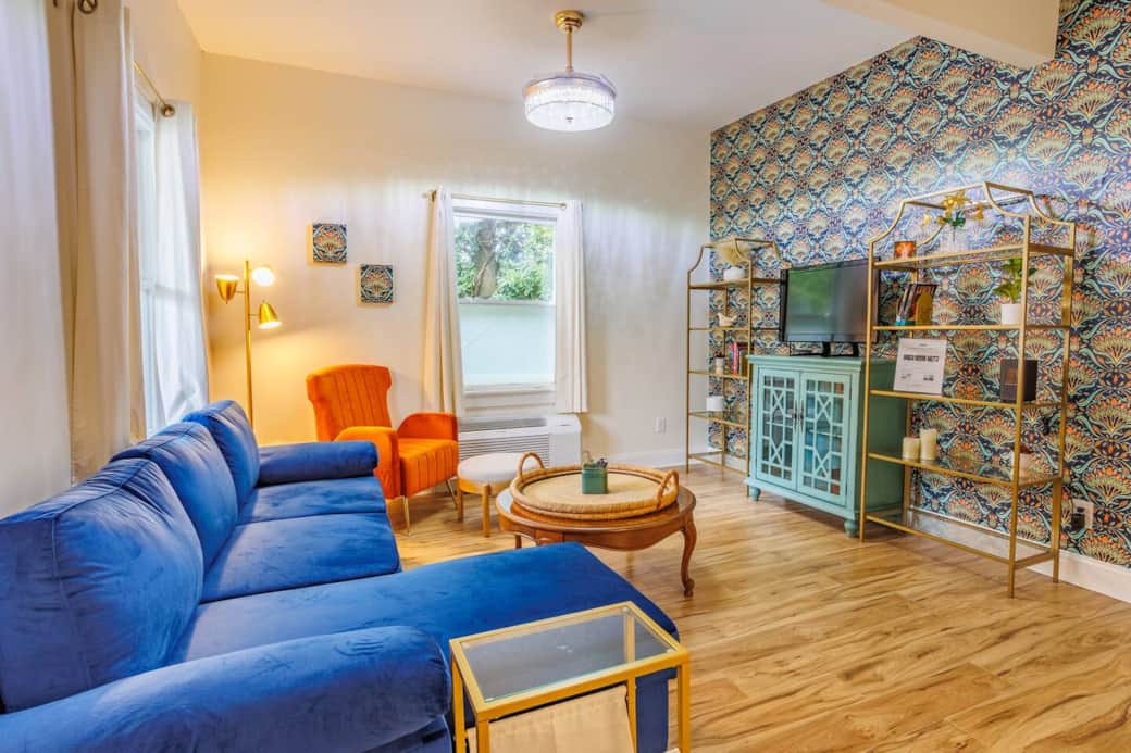 Living room with individually controlled wall unit air conditioner and heather (similar to hotel units, called a PTAC). TV is equipped with ROKU login, with some live TV channels. Guests must log in to their personal netflix/subscription accounts. Living room with individually controlled wall unit air conditioner and heather (similar to hotel units, called a PTAC). TV is equipped with ROKU login, with some live TV channels. Guests must log in to their personal netflix/subscription accounts.