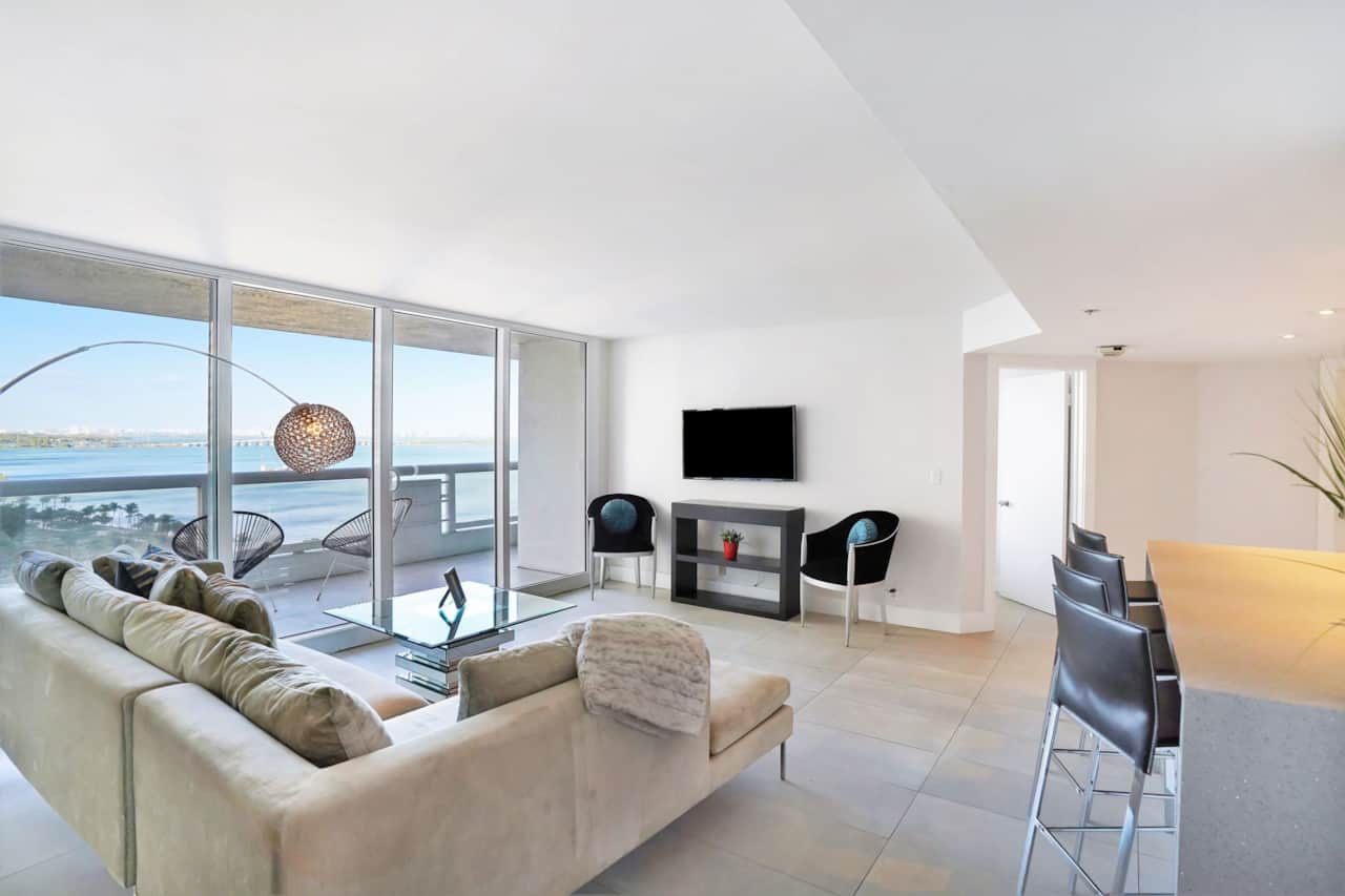 Living room, dining area, Roku Tv, balcony access