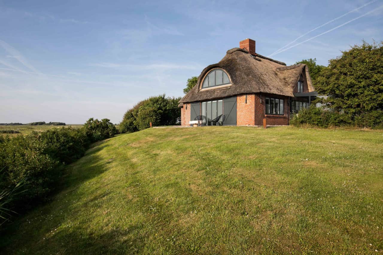 Thatched house on the warft mound