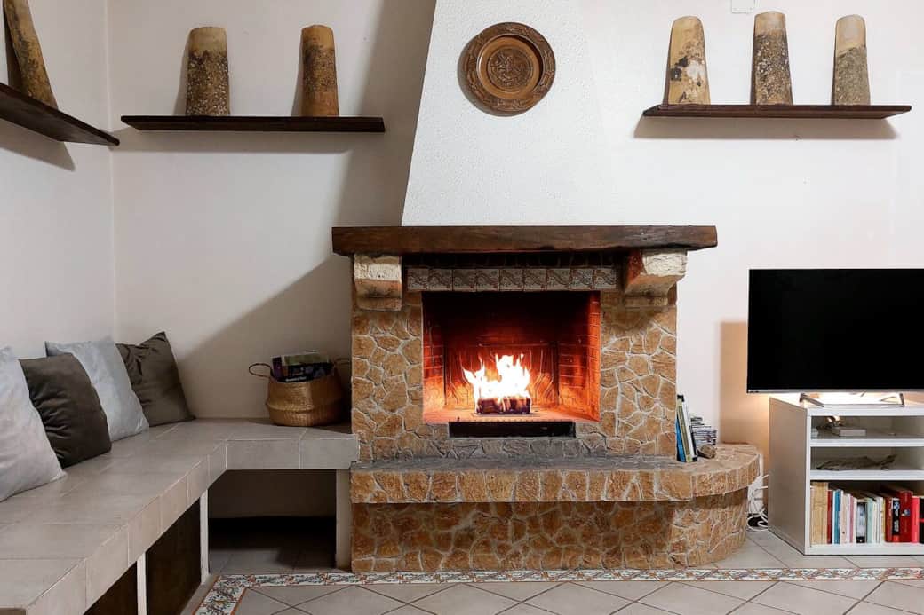On cold days you can light the fireplace in the living room