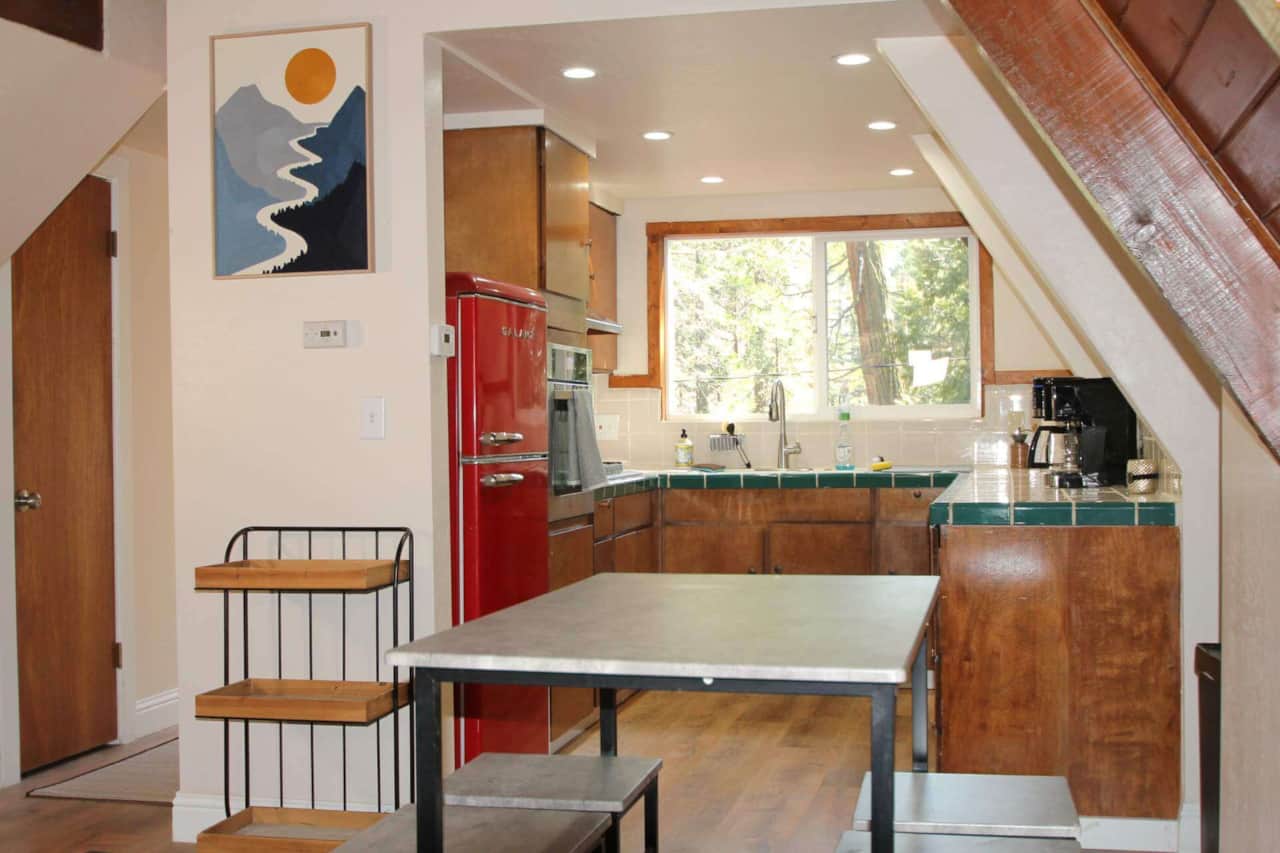 Dining table adjacent to kitchen
