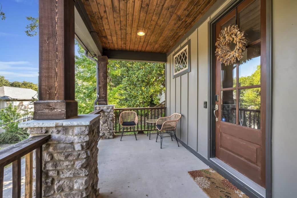 Enjoy your morning coffee al fresco on the front porch or take in beautiful sunsets in the evening. The height of this porch from the street makes the view that much better.