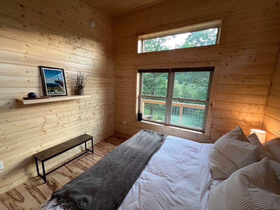 Second primary suite with luxe king bed and tons of natural light