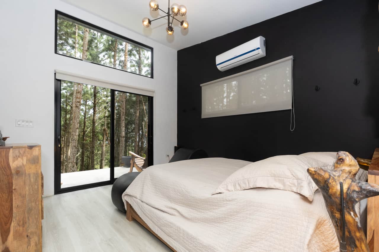 Wake up to lush forest views at this cozy couple cabin retreat near Panama City.