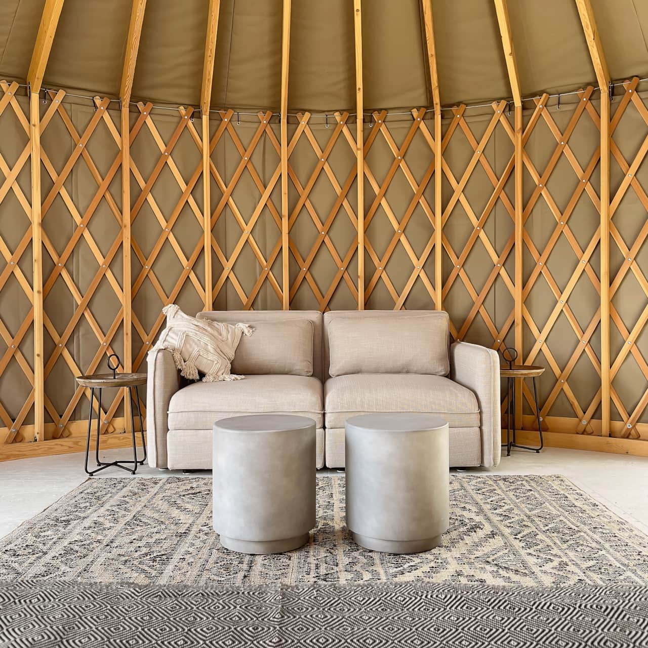 Our double-yurt is decorated in a warm, natural, and understated aesthetic.