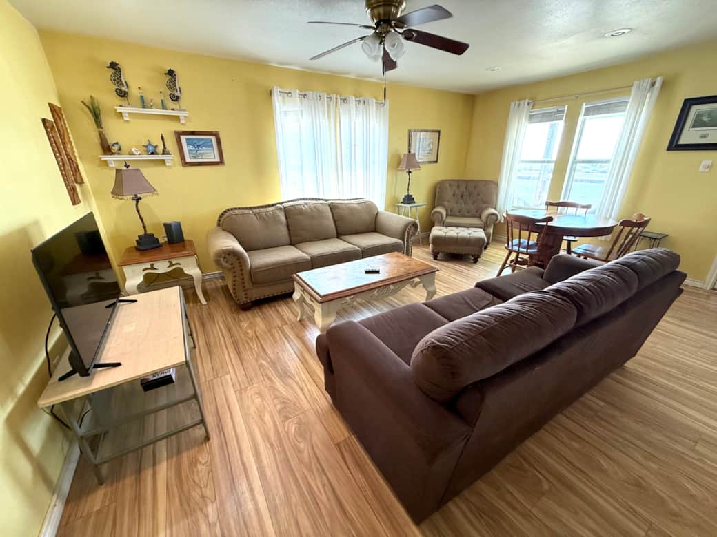 The living room has comfortable seating and a smart TV. The living room has comfortable seating and a smart TV.