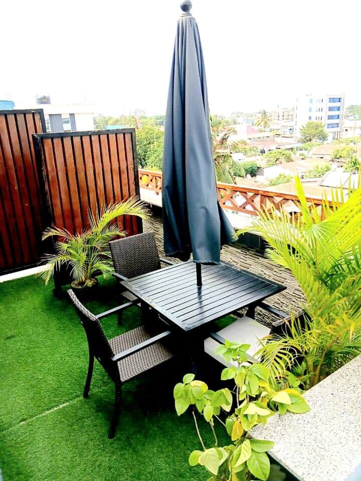 Outdoor sitting.  Eat you dinner here  while enjoying the breeze.