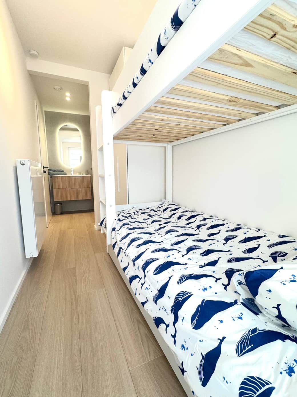 Bunk bed with extra single bed with bathroom