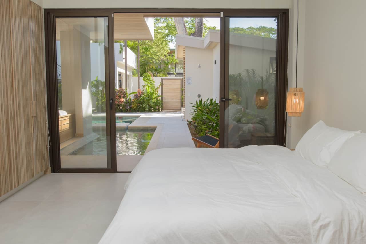 Master bedroom 1 located on first floor with king bed and ensuite bathroom