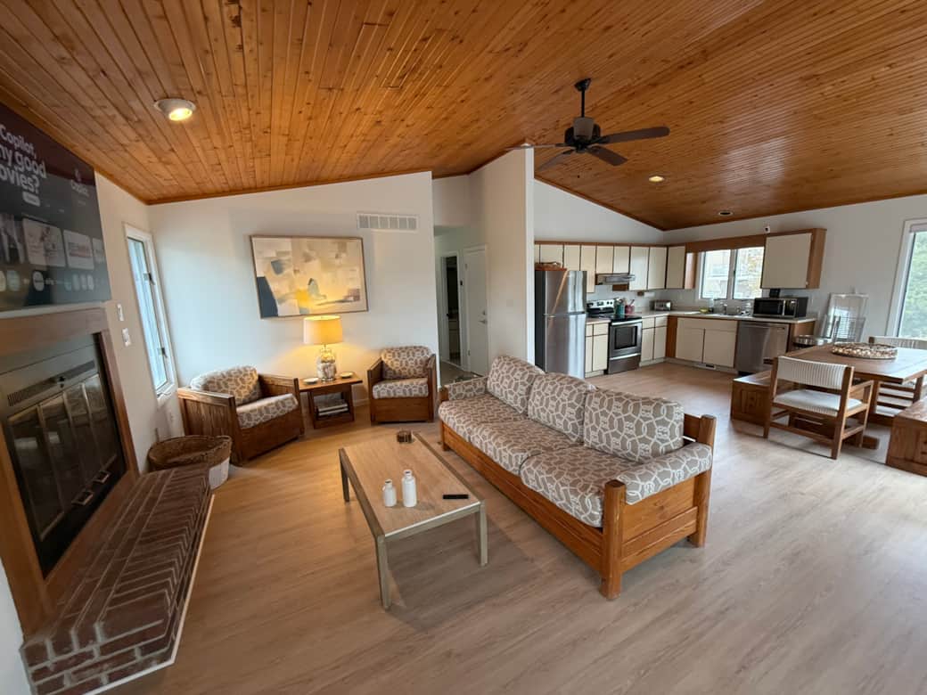 The Great Room - 65" Smart TV, new flooring, paint, decor. Attached screened porch. Canal-dock views