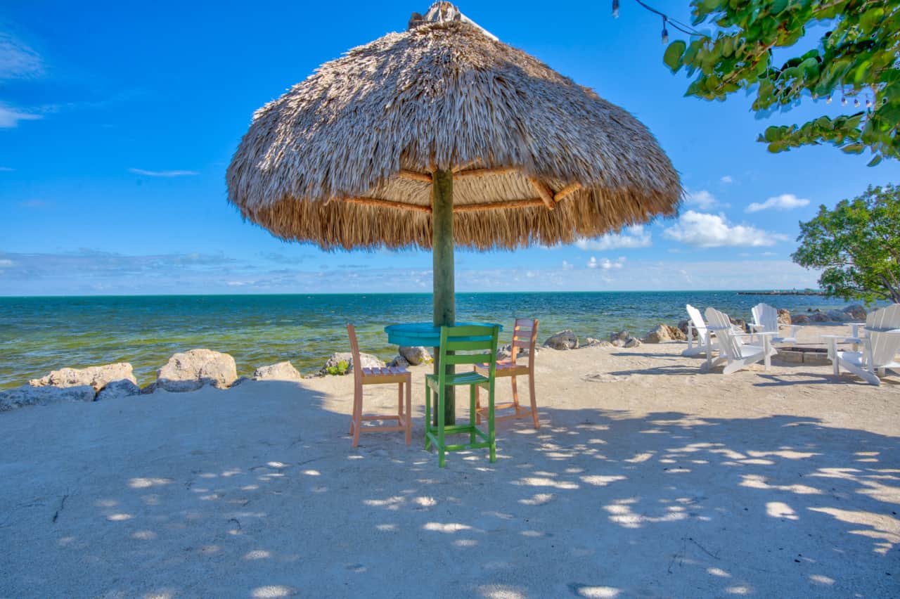 Man made beach and tiki hut.