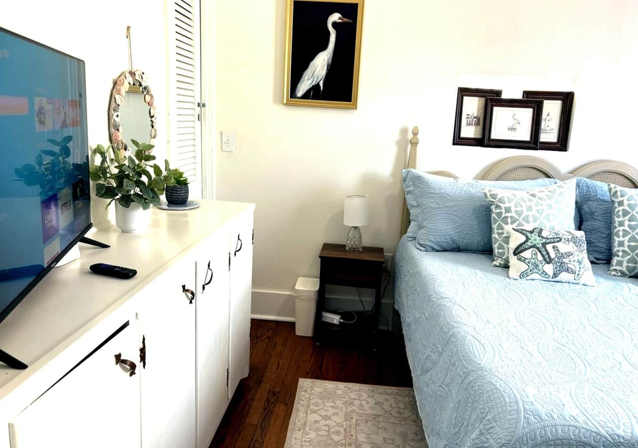 Your view as you walk into the private king bedroom with personal TV.