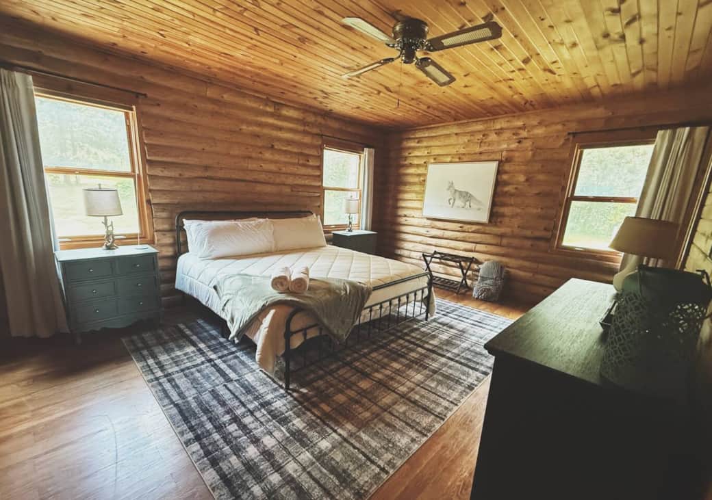 Primary bedroom with king bed, closet, and full attached bathroom. 