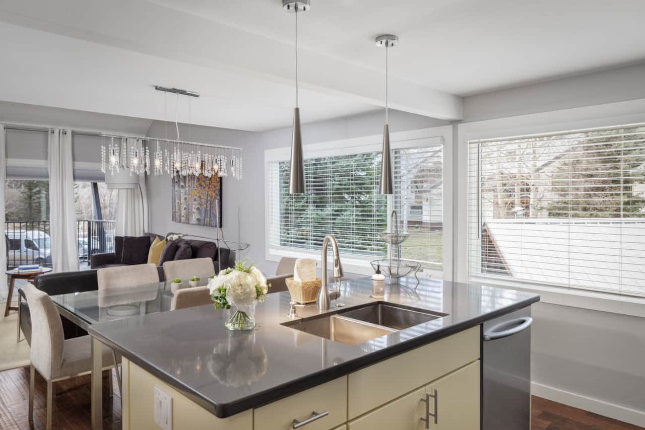 Open layout showing kitchen area looking into living room
