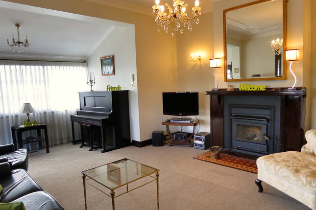 North facing living room with Pianola