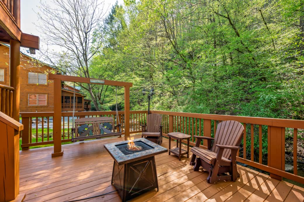 Sway on the two-person porch swing as the creek’s gentle babble sets the soundtrack