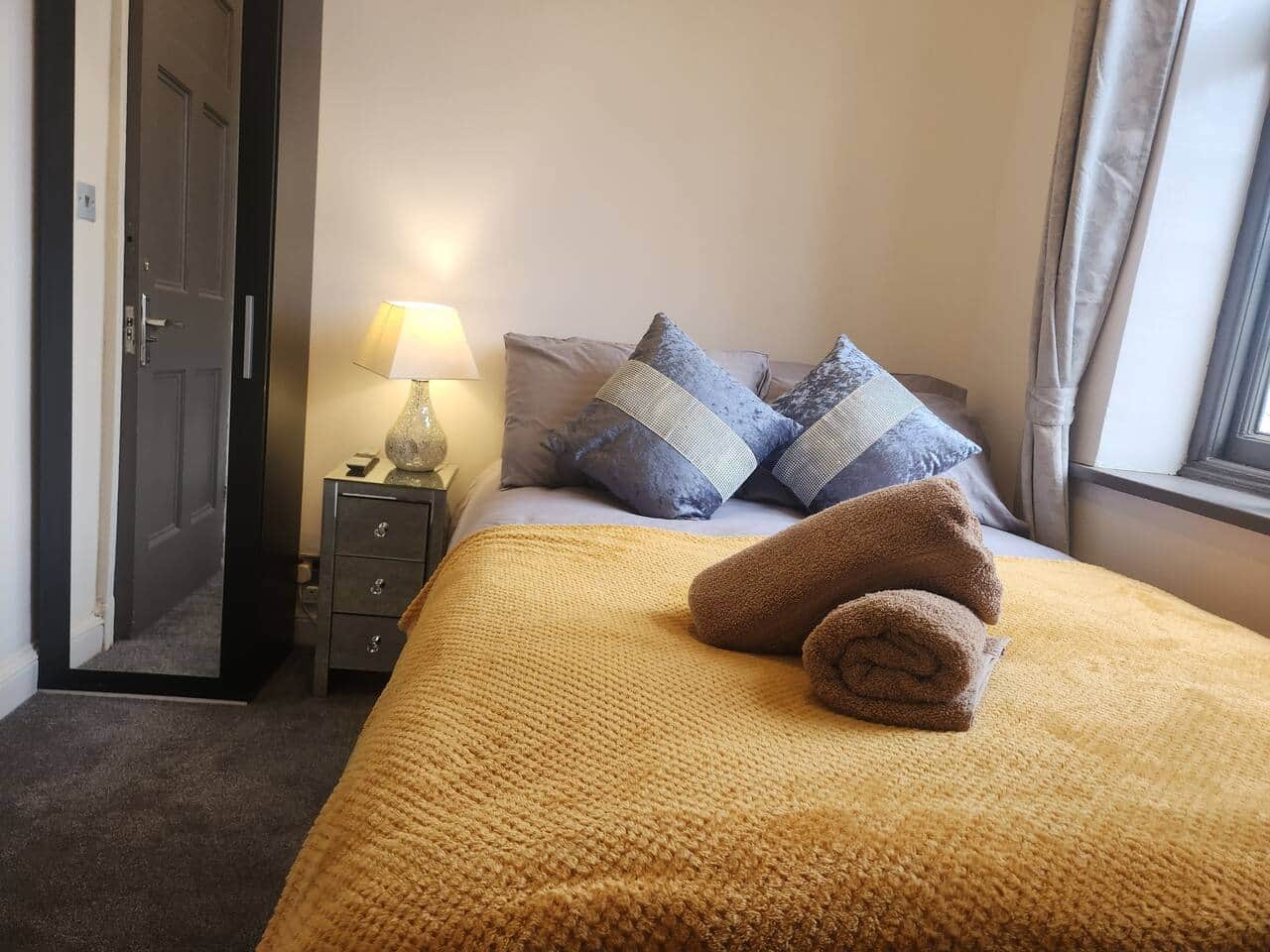 Comfortable bedroom at 239 Seymour Grove accommodation Manchester