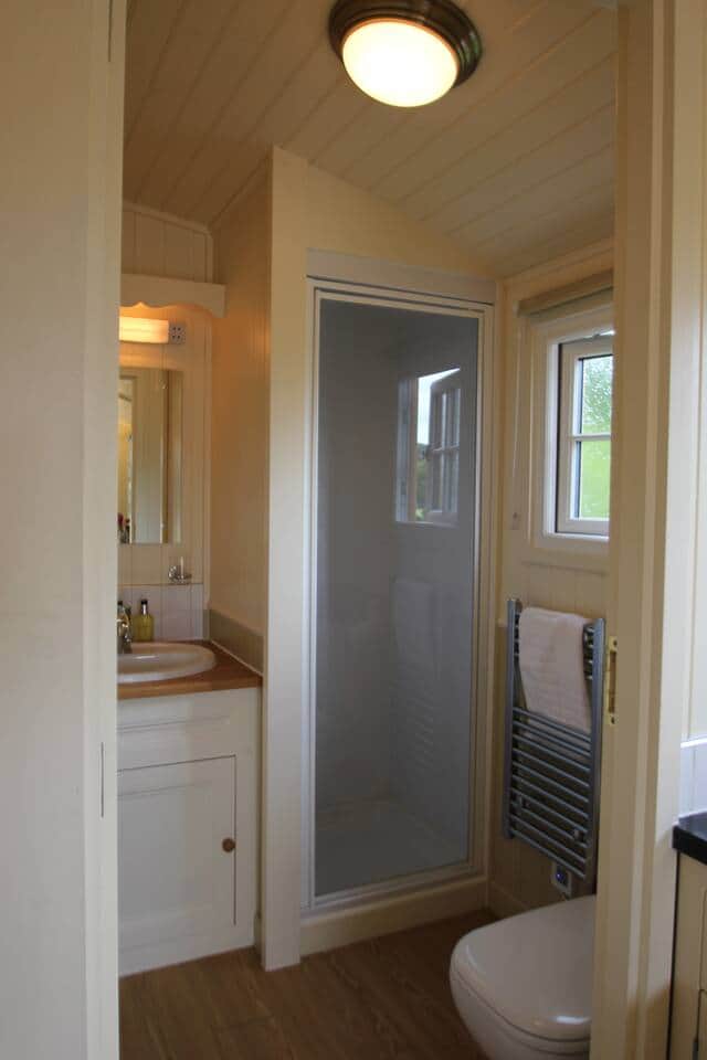 Shower room ( not a power shower) with sink and toilet Shower room ( not a power shower) with sink and toilet