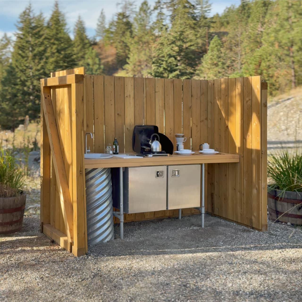 Private camp kitchenettes feature drinking water (cold only), a cooktop, utensils and dishware.