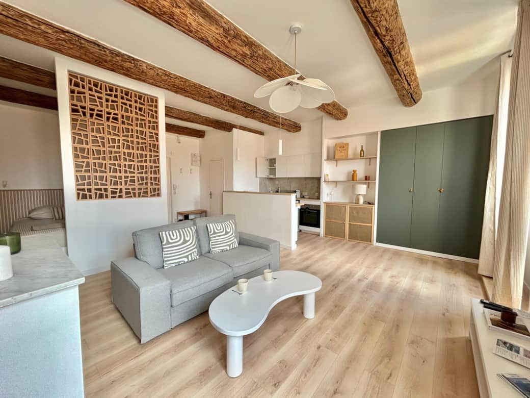 living room, sofa, coffee table, TV, kitchen