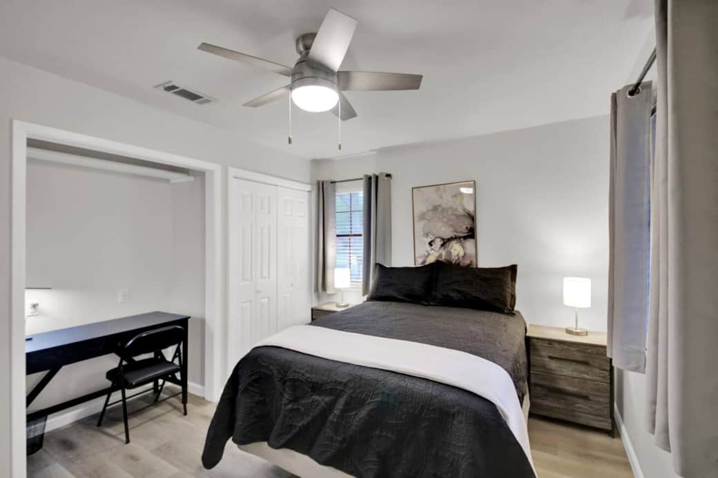 The second bedroom features a built-in work area. The second bedroom features a built-in work area.