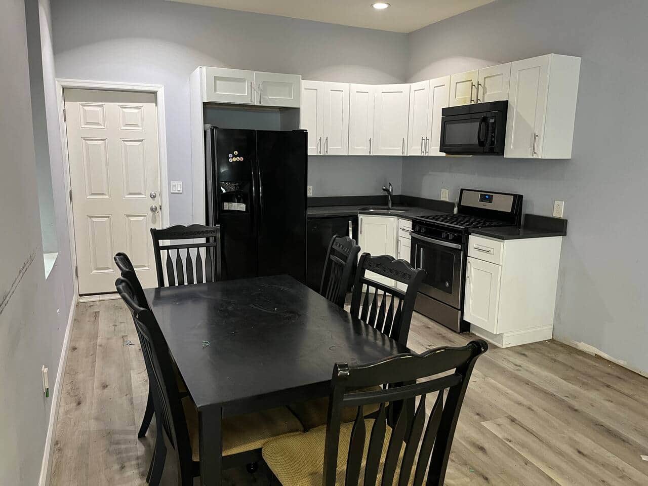 Dining table, full kitchen , dishwasher, range/oven, microwave, refrigerator.
