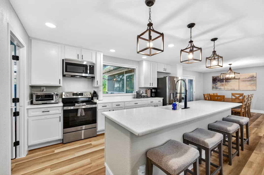 Kitchen with access to the dining room and living spaces