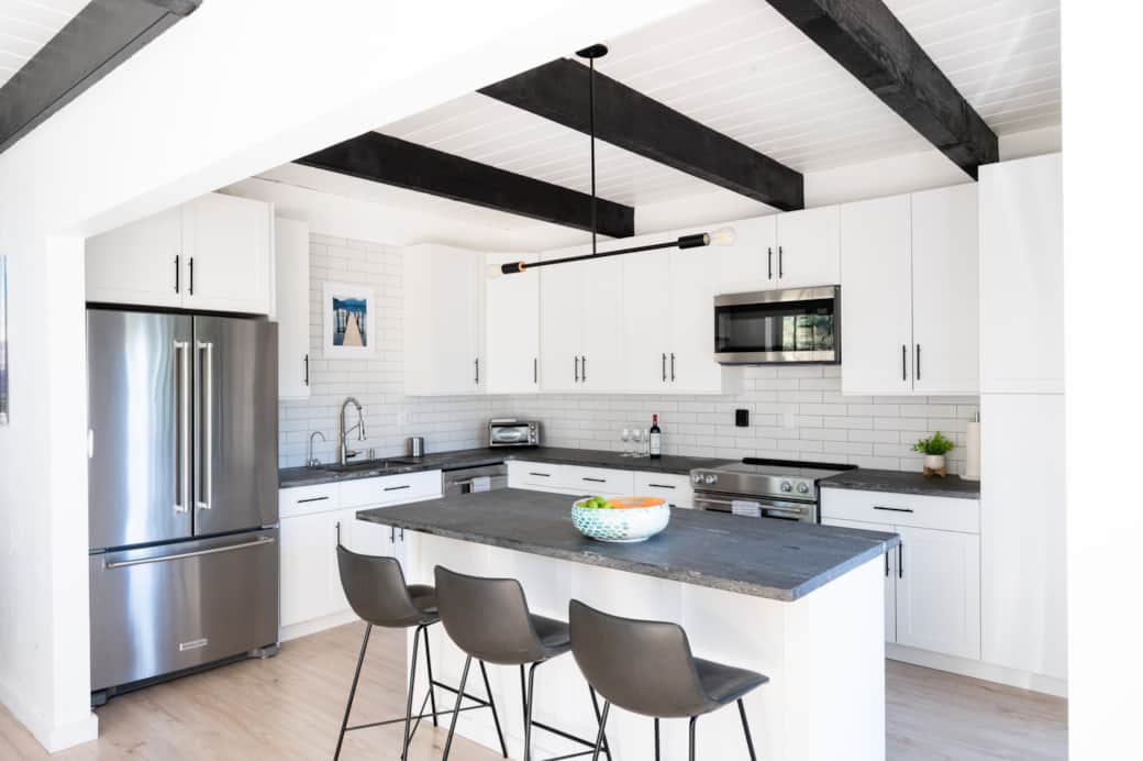 Modern kitchen with luxury leathered granite countertops.