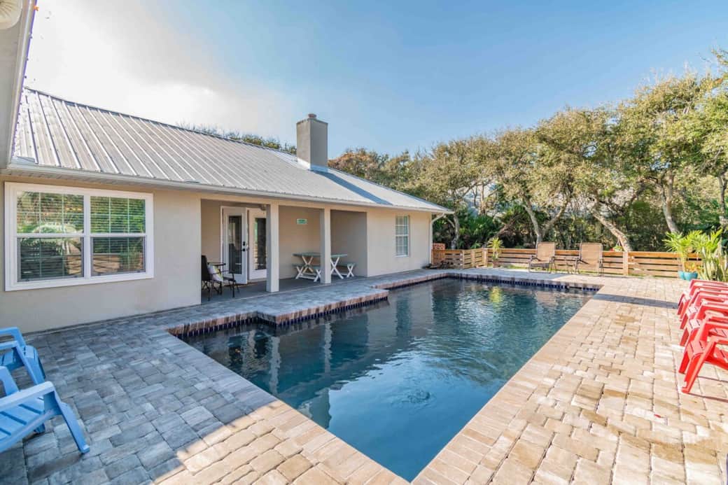 Covered patio with space for the whole family to eat and relax!  