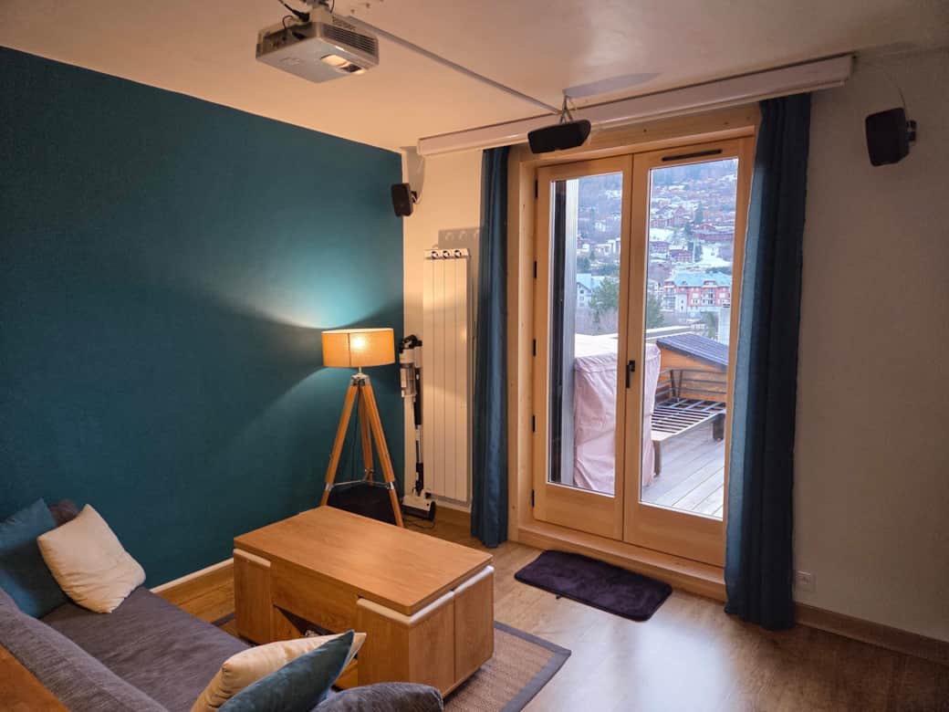 Spacious living room giving access to the private patio and garden