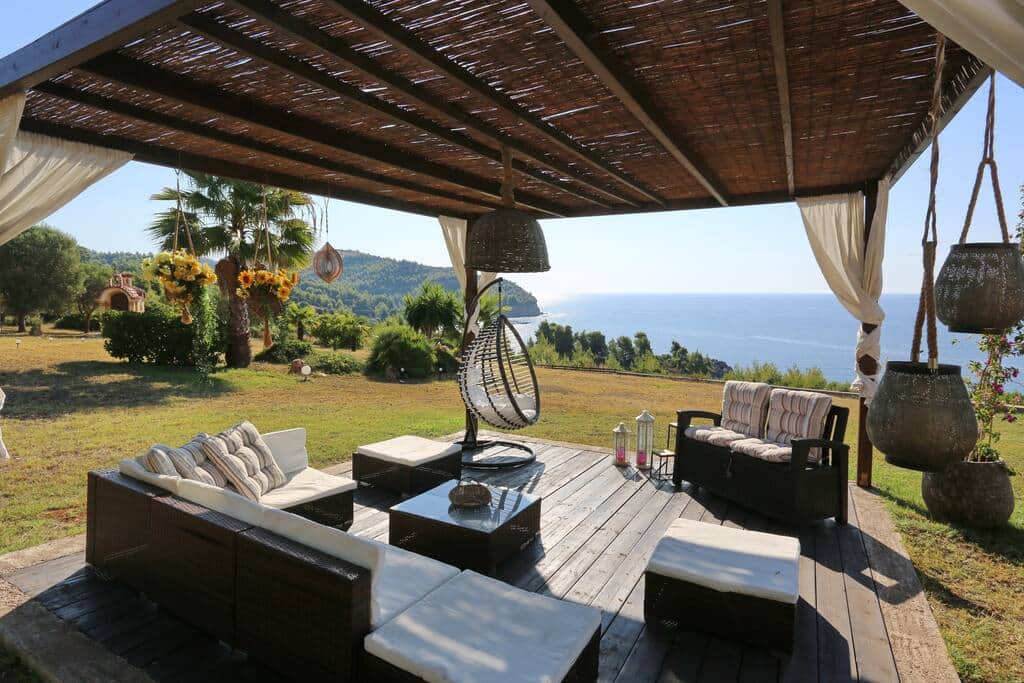 The outdoor living room is a lovely area for you to enjoy the view along with a refreshing drink!