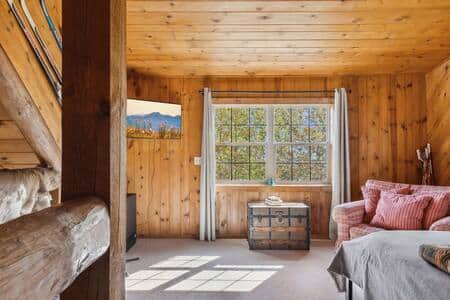 Sleeping loft with Fire-stick enabled TV.