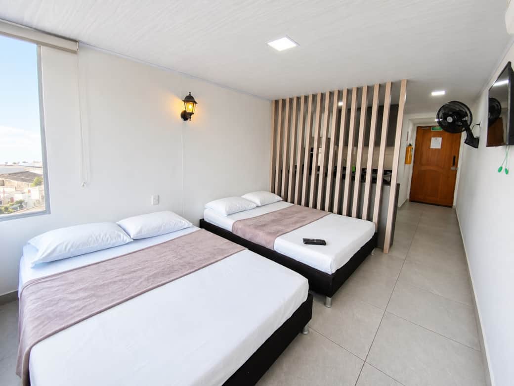 Habitación con dos camas dobles