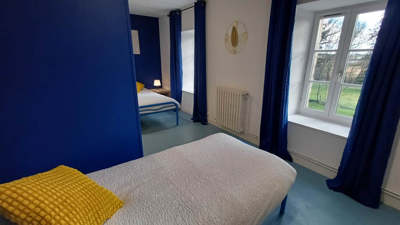 Chambre 1 (2 lits 1 personne)