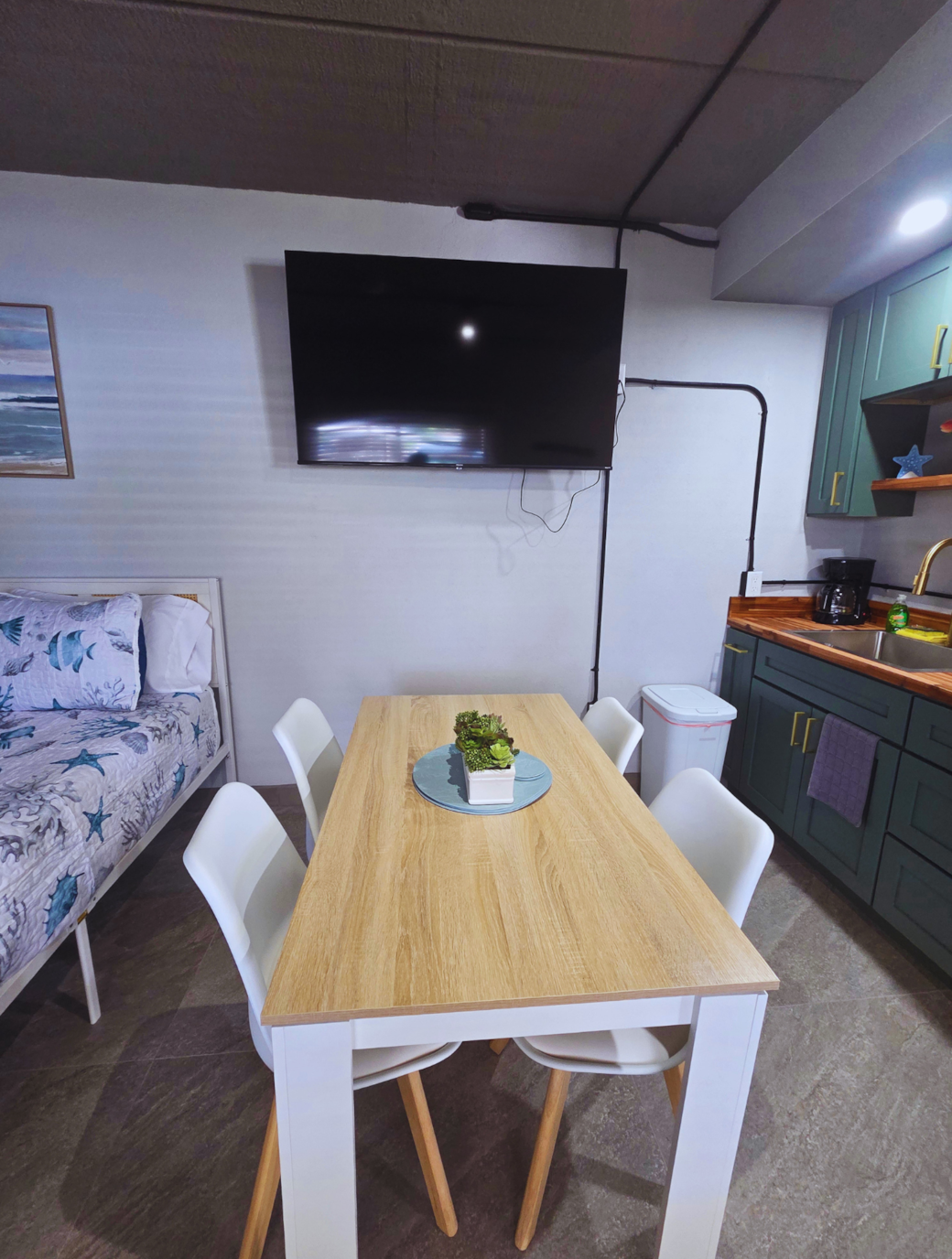Enjoy meals just steps from the kitchen with a Smart TV for entertainment. Treasure Island, FL