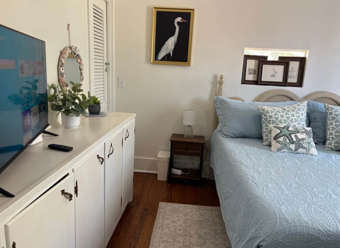 Your view as you walk into the private king bedroom with personal TV.