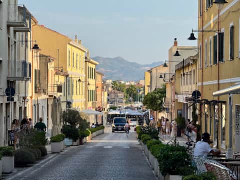 Taxi van driving up to the old centre of Olbia, Sardinia, photographed by RENTAL12