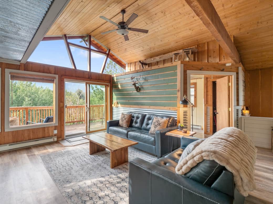 Stylish and comfy with lots of blankets and the cozy pellet stove. The perfect place to read a good book or watch a movie. 