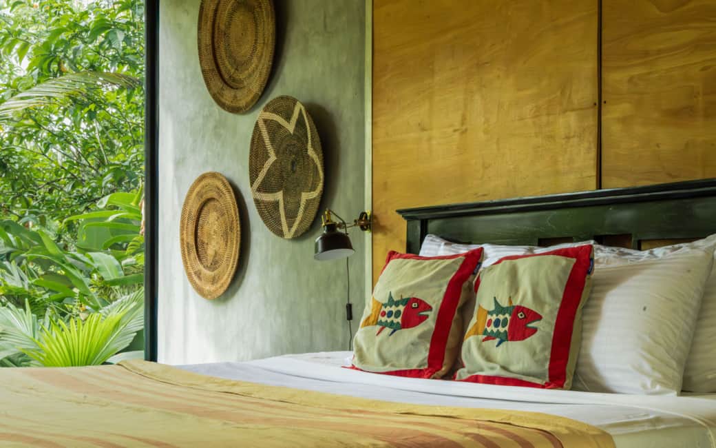 Wake up looking straight into the jungle from your bed