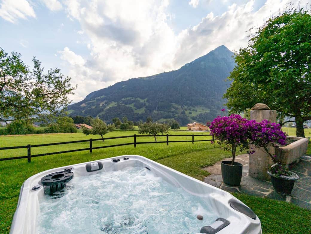 Private hot tub with amazing views of the surrounding mountains and the stars. The hot tub is built for 3 people, but will easily fit 4-5.