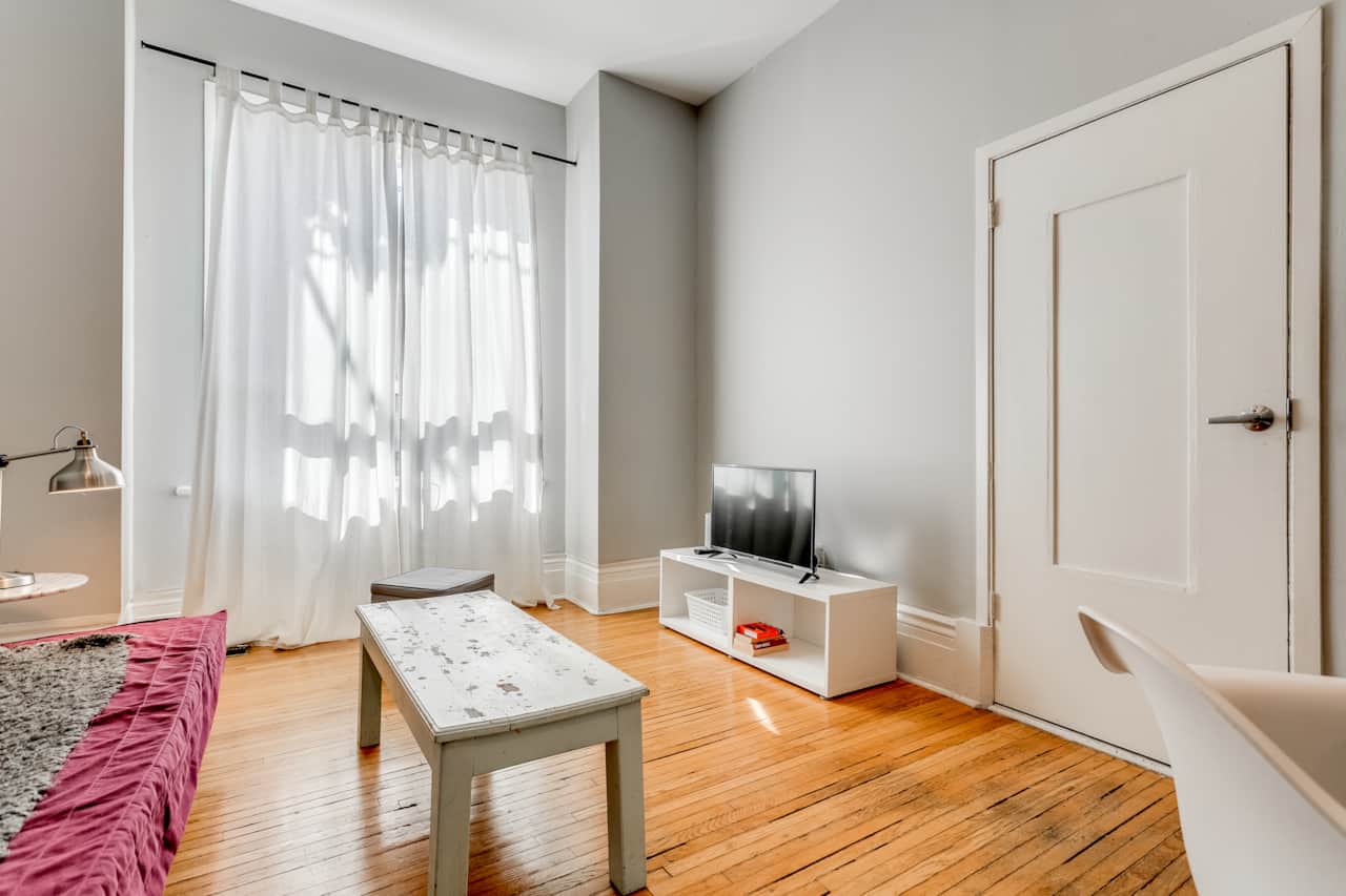 Small but inviting entrance in a Toronto short-term rental, setting a cozy tone.