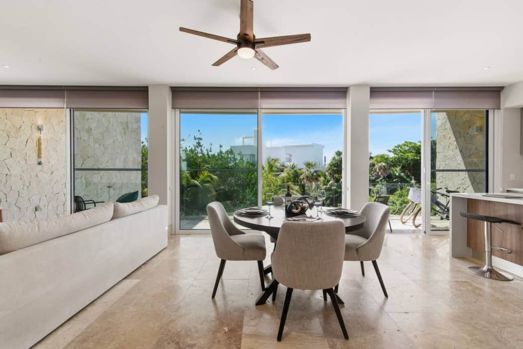 Enjoy meals together in the dining area for 4 while taking in the beautiful greenery views through the floor-to-ceiling windows. Step out onto your private balcony, relax in the sea breeze, or take the bikes for a ride around the community.