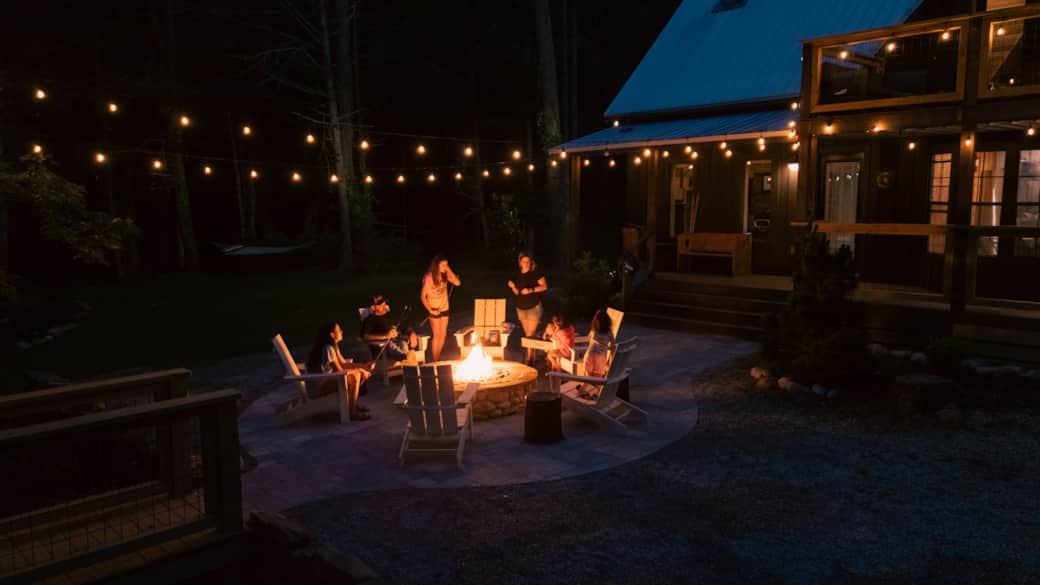 Family time at night. Outdoor speakers playing your favorite music. Family time at night. Outdoor speakers playing your favorite music.