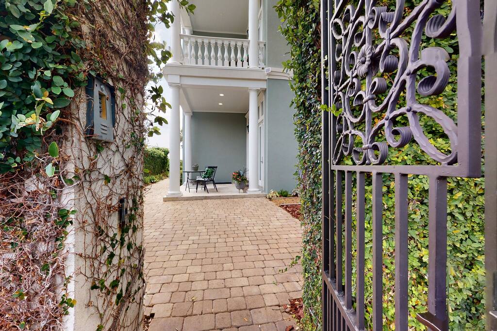 Entrance to condo through iron gate