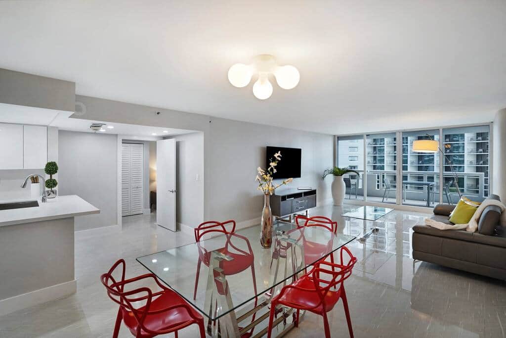 Dining area, living room, balcony access, Roku streaming tv