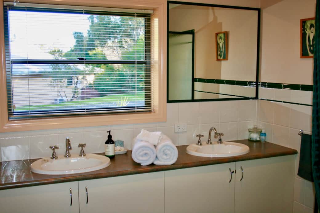 Bathroom with Double Sink Vanity and Walk-in Shower