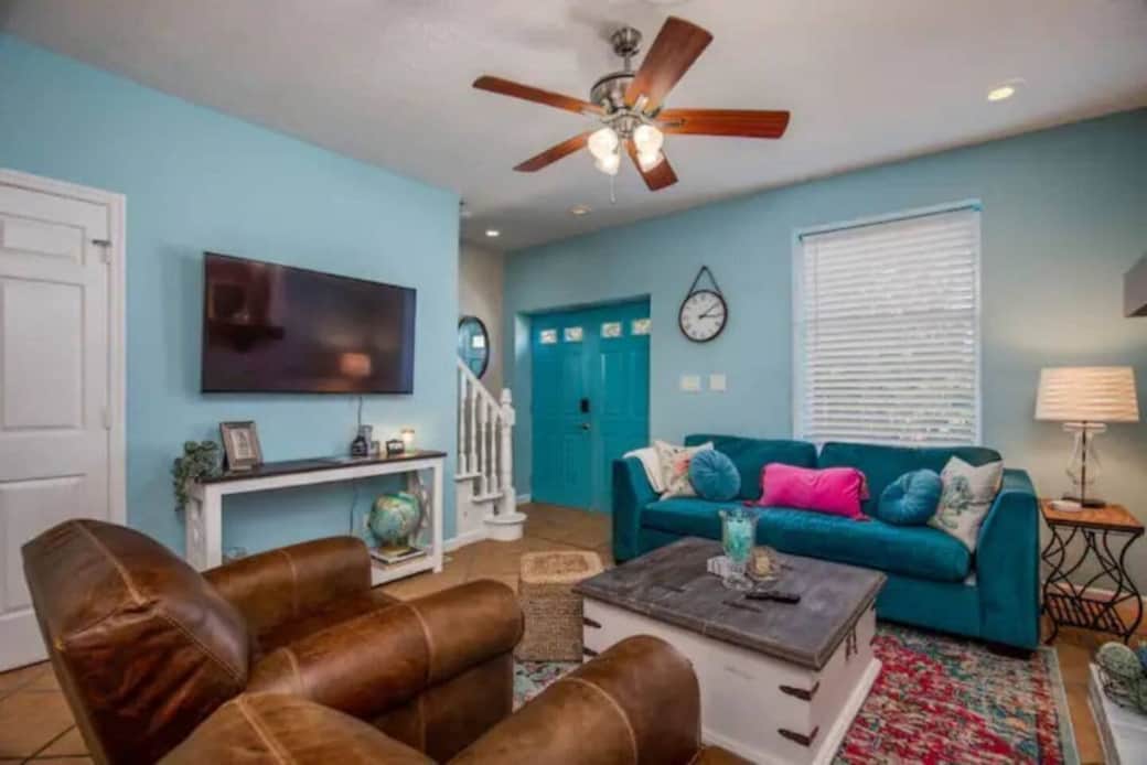 Living Room: Velvet sofa + Leather swivel chairs = LUXURY!