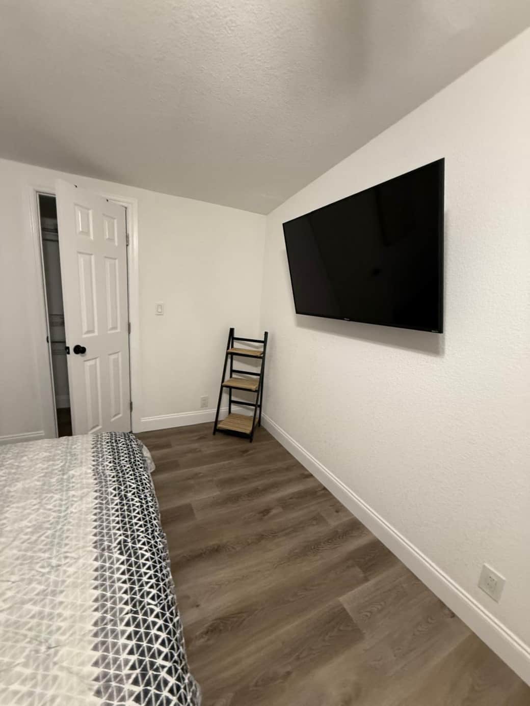 Smart TV with Netflix included and a convenient accent side table. Lakeland, FL